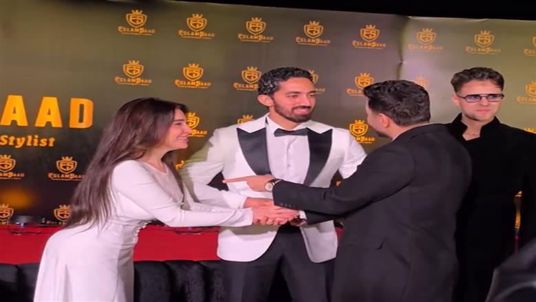 مي عز الدين وزوجها