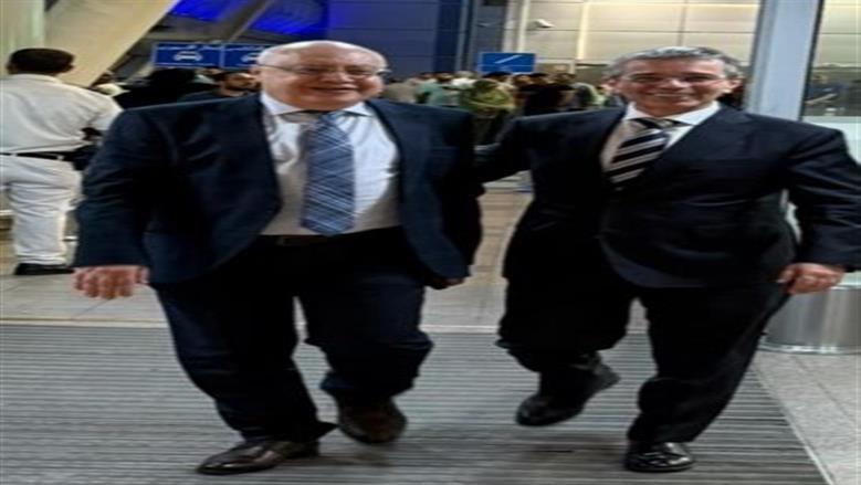 ب