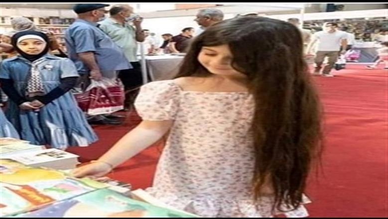 طفلتين معرض الكتاب