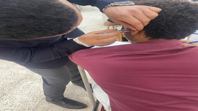 خبير تربوي يكشف الموقف القانوني لواقعة استخراج سماعة من أذن طالب بجامعة أسيوط