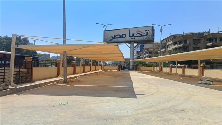 استمرار تطوير ميدان الكيت كات بالجيزة.. وتجهيز موقف السرفيس بمظلات لحجب الشمس