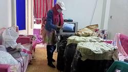صور.. ضبط مصنع لإنتاج كمامات غير مطابقة للمواصفات في شقة بالعمرانية