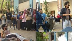 بعد ظهوره بـ"ملابس مهلهلة".. القصة الكاملة لطالب عين شمس المحتج