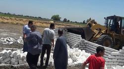 إزالة 8 حالات تعد على نصف فدان في البحيرة