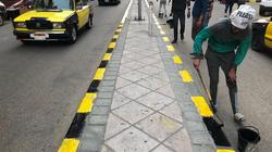 استكمال أعمال دهانات الأرصفة بشرق الإسكندرية