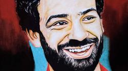 "فيصل" يرسم جداريات وبورتريهات: "أحلم بتلوين حوائط طنطا"