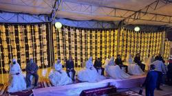 شيك بـ10 آلاف جنيه.. سوهاج تحتفل بزفاف 12 عروسا من ذوي الإعاقة