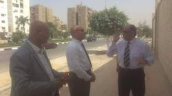 بالصور| طلاء سور استاد القاهرة استعدادا لـ"أمم أفريقيا"