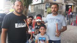 من نقاش على الحوائط لرسام على الوجوه.. "مجدي" يرسم الفرحة بأمم أفريقيا