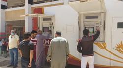 ماكينات صرف آلي متحركة لخدمة أهالي كفر جعفر الخاضعة للحجر بالغربية