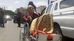 "عم عزت" يدلي بصوته على كرسي متحرك بالمنيا: "لاستقرار الوطن"