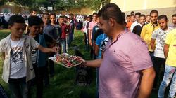 مدرسة بسوهاج تستقبل طلابها بحلويات وبلالين: بنحل مشاكلهم الأسرية كمان
