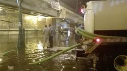 بالصور| الدفع بـ 40 سيارة كسح  لسحب مياه الأمطار من الأنفاق في أسيوط
