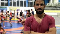 ظريف يبرر إعدام المصارع نويد أفكاري ويعرض على أمريكا تبادل السجناء