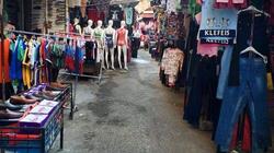 كورونا يضرب أسواق بورسعيد.. "يا لبس مين يشتريك"