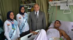 وفد من جامعة الإسكندرية يزور مصابي القوات الملسحة بمجمع المعادي
