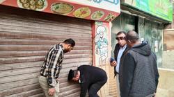 حملات بالجيزة على المحال المخالفة وغلق مركزين للدروس الخصوصية