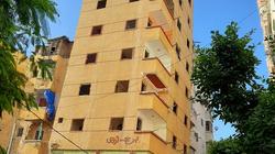 إخلاء وهدم.. القصة الكاملة لبرج "كرموز المائل" في الإسكندرية