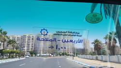 وضع ملصقات بالتعريفة الجديدة على سيارات "التاكسي" في السويس