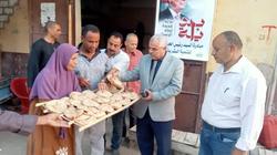 توزيع الخبز مجانا في قرية تل بني عمران بالمنيا ضمن مبادرة «بداية»
