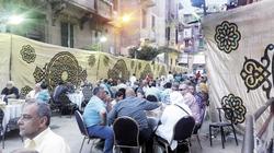 حفل إفطار جماعى بعد إزالة «البرج المائل»