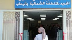نائب يطالب بإجبار المتعاملين مع المصالح الحكومية على ارتداء كمامات
