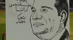 مها كمال ترسم صورة جرافيتي لـ"السيسي" في مؤتمر "أنت الأمل"