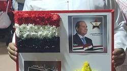 أعلام وورود.. 8 صور تٌلخص أول أيام انتخابات المصريين بالخارج