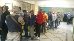 إقبال كبير على لجان بولاق أبو العلا رغم الأمطار والعاصفة الترابية