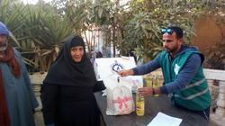 توزيع 34680 شنطة مواد غذائية من "مصر الخير" في المنيا