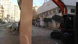 بناء على طلب الأهالي.. كواليس هدم سور قسم ثان سوهاج
