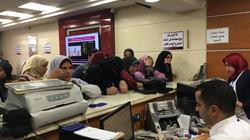 عاجل| بالصور| إقبال كبير على بيع الدولار فى فروع "بنك مصر"