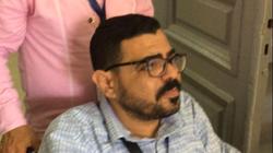 من على كرسي متحرك.. شاب من ذوي الإعاقة يشارك في الانتخابات
