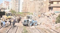 نقل سكان عقار مجاور للعقار المنهار بالإسكندرية إلى جمعية خيرية