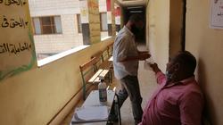 ناخبون في بولاق وأرض اللواء: الجو نار لكن لازم نقف جنب مصر