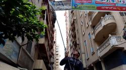 حملة لإزالة اللوحات الإعلانية المخالفة بحي المنتزه ثان بالإسكندرية