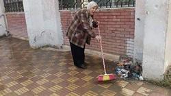 مديرة مدرسة ثانوي بالإسكندرية تجفف الفناء من مياه الأمطار بعد غرقه