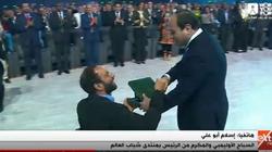 السباح إسلام أبو علي: "فخور بتكريم السيسي.. وحضور منتدى الشباب شرف"