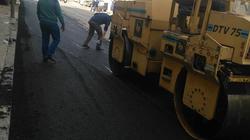 استكمال أعمال تمهيد الطرق بنطاق حي الجمرك بالإسكندرية