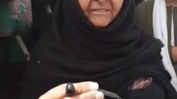 الحاجة «شربات» أقدم موردة قمح إلى صوامع أسيوط: «بقالي 30 سنة بزرع»