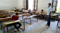 طلاب الثانوية العامة يؤدون الامتحان التجريبي وسط إجراءات احترازية