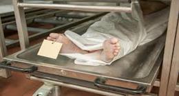 انتداب الطب الشرعي لتشريح جثة شخص سقط داخل منور عقار بالظاهر