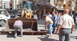 استمرار حملة إزالة الإشغالات والتعديات في سوق الحميدي ببورسعيد (صور)
