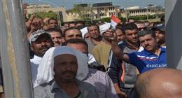 اصطفاف أبناء الجالية المصرية بالكويت أمام اللجان مع بدء التصويت في انتخابات النواب