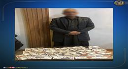 ضبط شخص يوزع مبالغ مالية أمام إحدى اللجان للتصويت لأحد المرشحين بالمنوفية