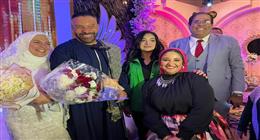 أول ظهور لزوجة محمد خميس بعد زفافهما.. زيارة لمعرض الكتاب (فيديو)