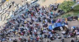 توافد السودانيين على محطة مصر لاستقلال قطار أسوان تسهيلا لعودتهم