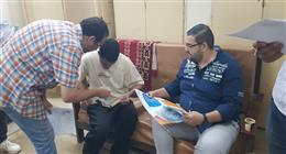 توقيع الكشف الطبي على الطلاب الجدد من ذوى الإعاقة بجامعة سوهاج
