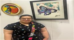 مريم وجيه فنانة تشكيلية مصابة بمتلازمة داون.. لمسات صامدة وإرادة حديدية