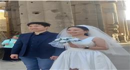فرحة معبد الأقصر.. مصور الزفاف الصيني: احتفلنا بيهم